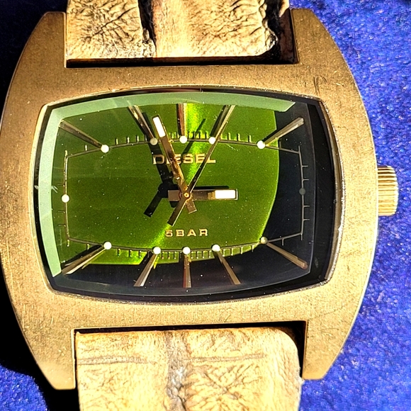 Guess Other - Diesel watch with embossed leather band.